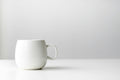 Plain white ceramic coffee mug sample